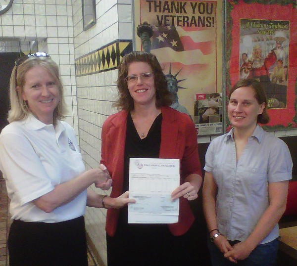 Robyn Philips (l), chapter public relations officer, and Dr. Lori Alvin (r), assistant professor, University of West Florida, present the Ralph W. Shrader Diversity Scholarship to Aletheia Lynn Zambesi in November.